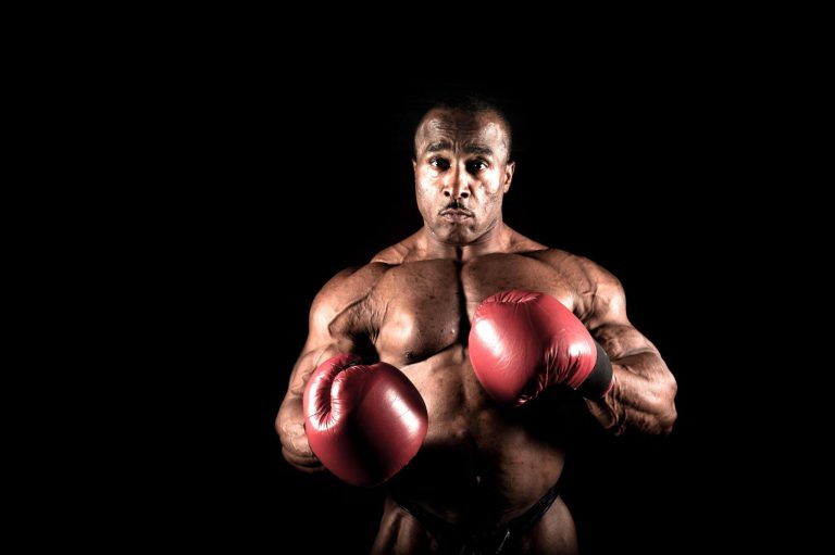 boxer wearing red boxing gloves